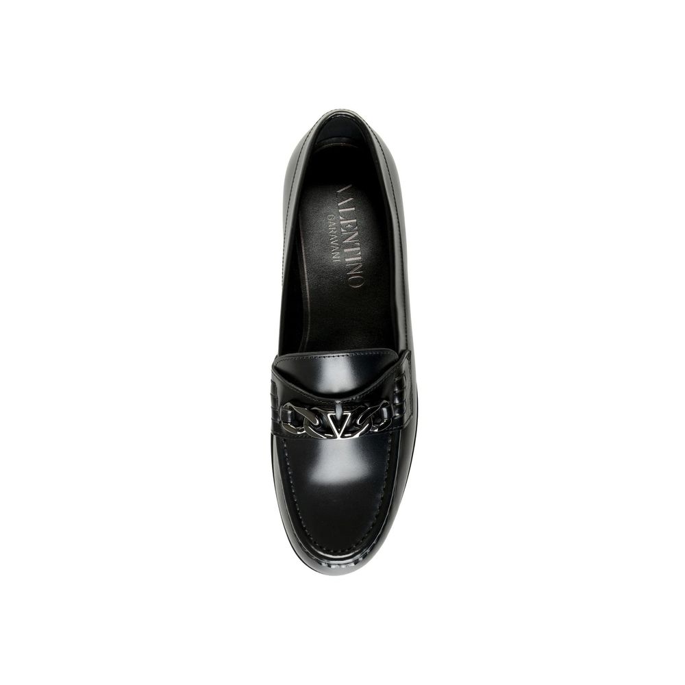 Valentino Garavani Schwarze Slipper aus Leder