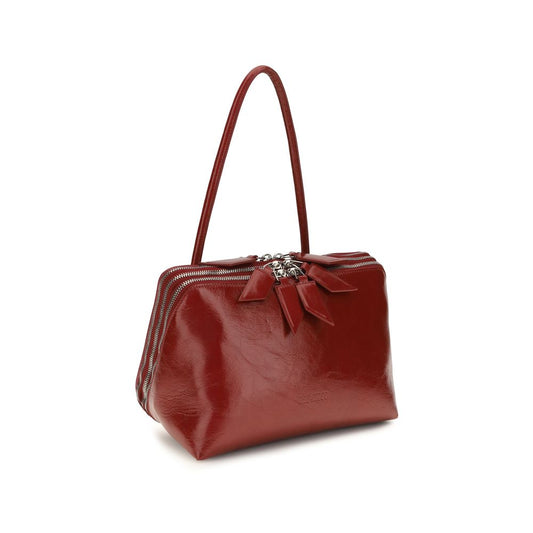 The Attico Schultertasche aus rotem Kalbsleder Bos Taurus
