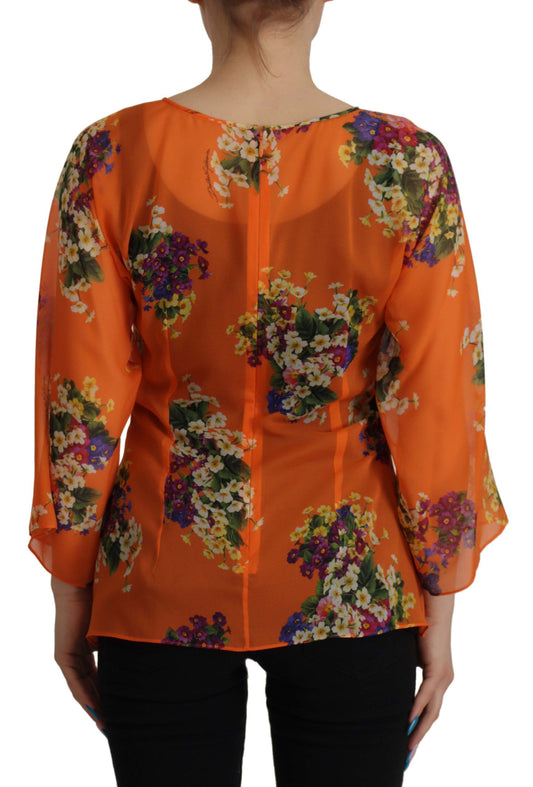 Dolce & Gabbana – Orangefarbene Bluse mit Blumenmuster und langen Ärmeln