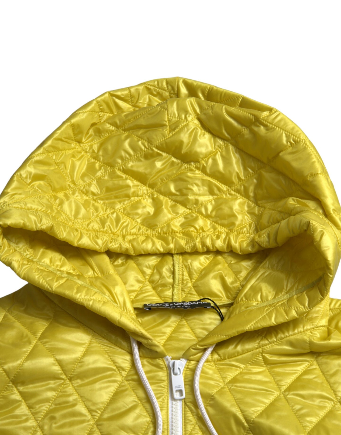 Dolce & Gabbana – Gelbe, gesteppte Pulloverjacke aus Nylon mit Kapuze