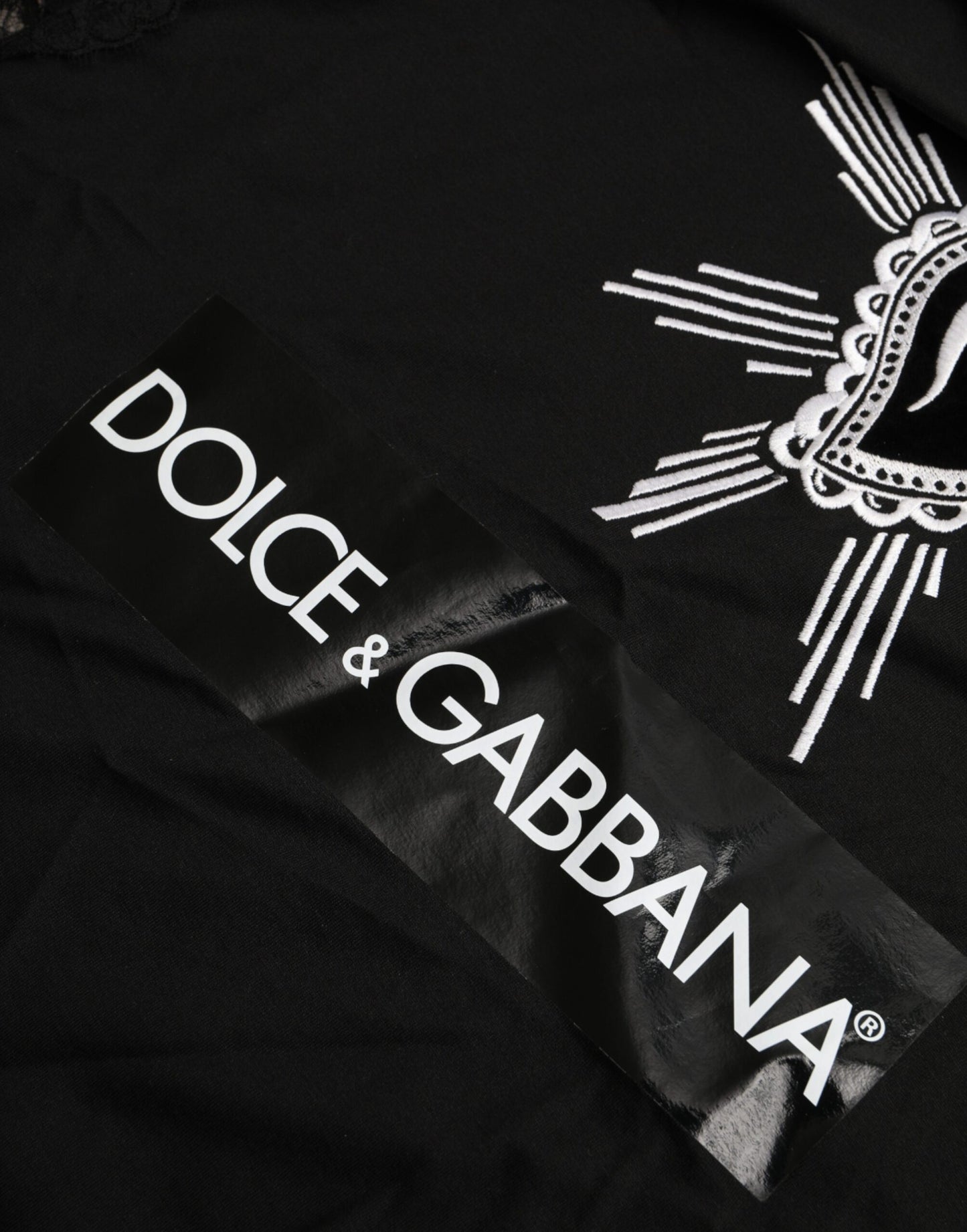 Dolce & Gabbana Schwarzes T-Shirt aus Baumwollspitze mit Herz-Jesu-Print