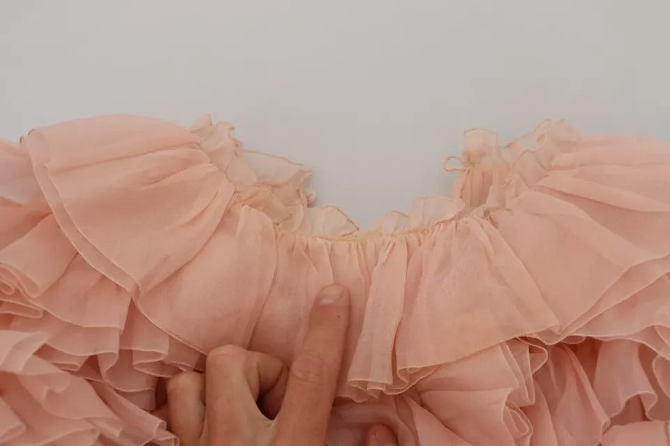 Dolce & Gabbana – Rosa Pullover mit Rüschen und langen Ärmeln