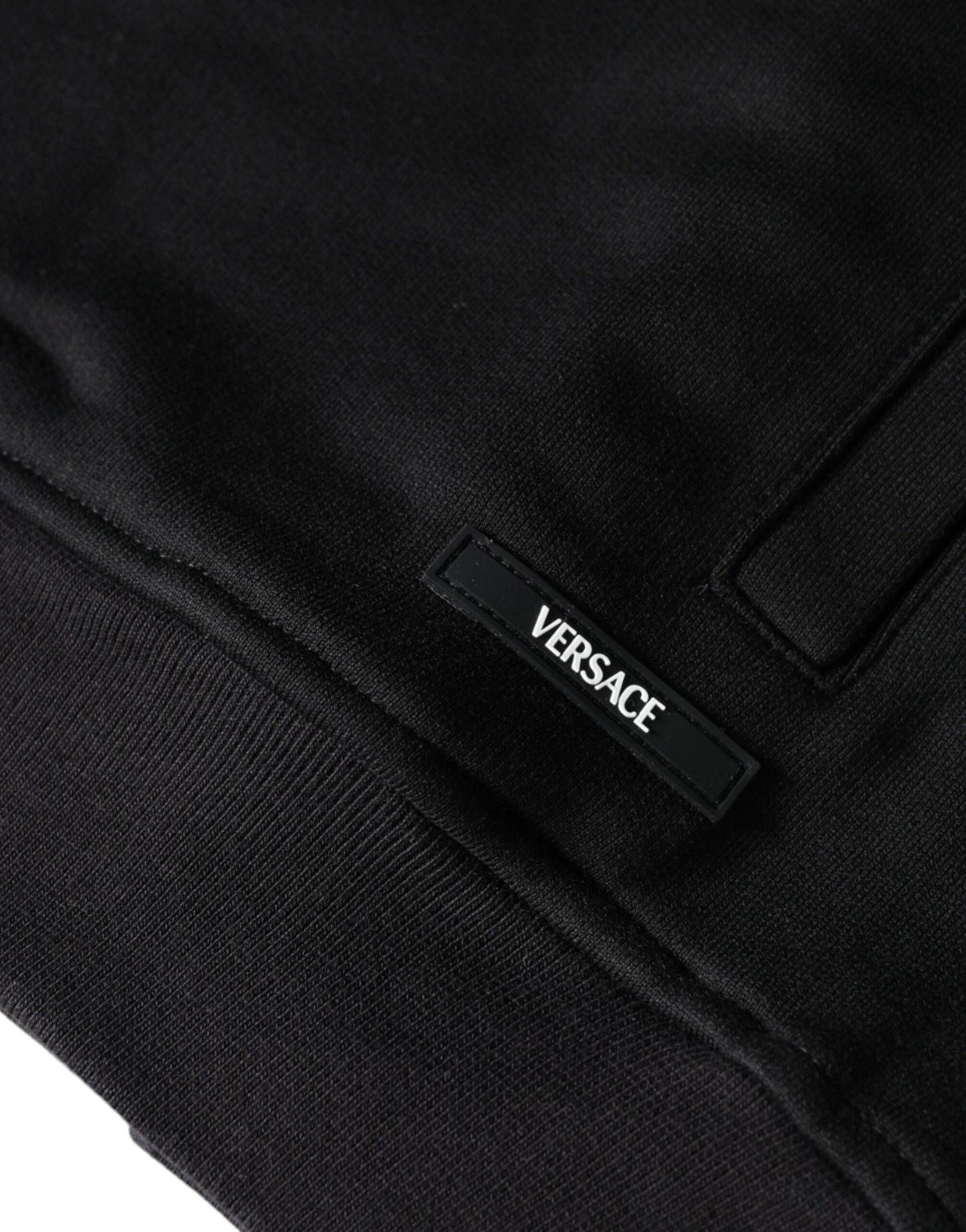 Versace – Kapuzenpullover aus Baumwolle mit durchgehendem Reißverschluss und Medusa-Print in Schwarz