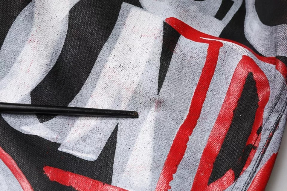 Dolce & Gabbana – Mehrfarbige Skinny-Jeans aus Baumwoll-Monogramm