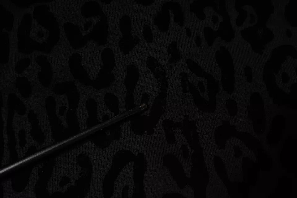 Dolce & Gabbana – Schwarzer Kapuzenpullover aus Baumwolle mit durchgehendem Reißverschluss und Leopardenmuster