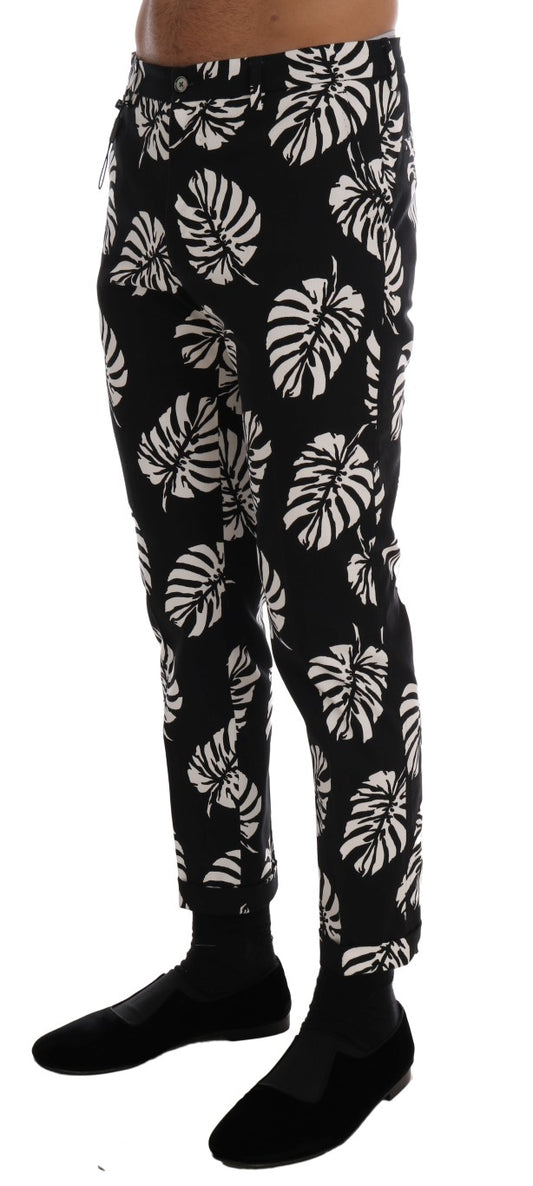 Dolce & Gabbana – Schmale Hose aus Baumwollstretch in Weiß und Schwarz mit Blattmuster