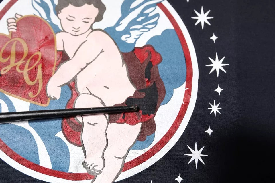 Dolce & Gabbana – Blaues T-Shirt mit kurzen Ärmeln aus Baumwolle mit Engelsdruck