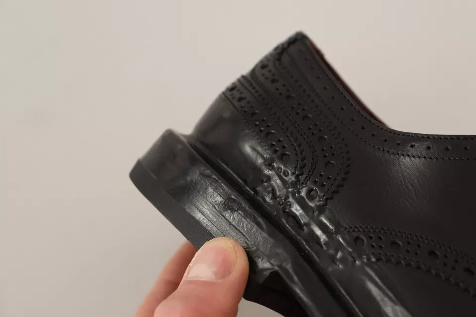 Dolce & Gabbana – Derby-Schnürschuhe aus perforiertem Leder in Schwarz