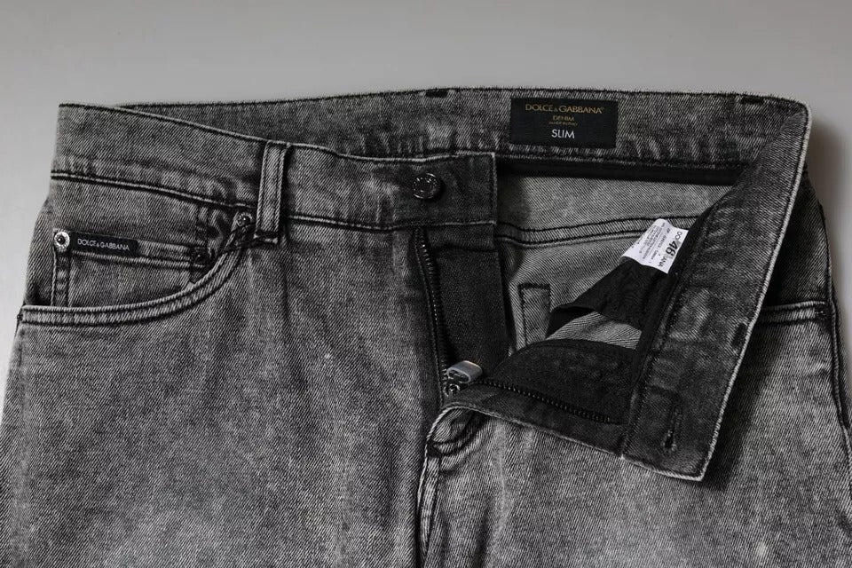 Dolce & Gabbana – Slim Fit-Jeans aus Baumwolle mit Logo-Schild in Grau