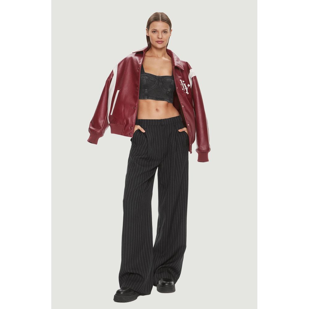 توب جينز تومي هيلفيغر أسود من القطن المعاد تدويره