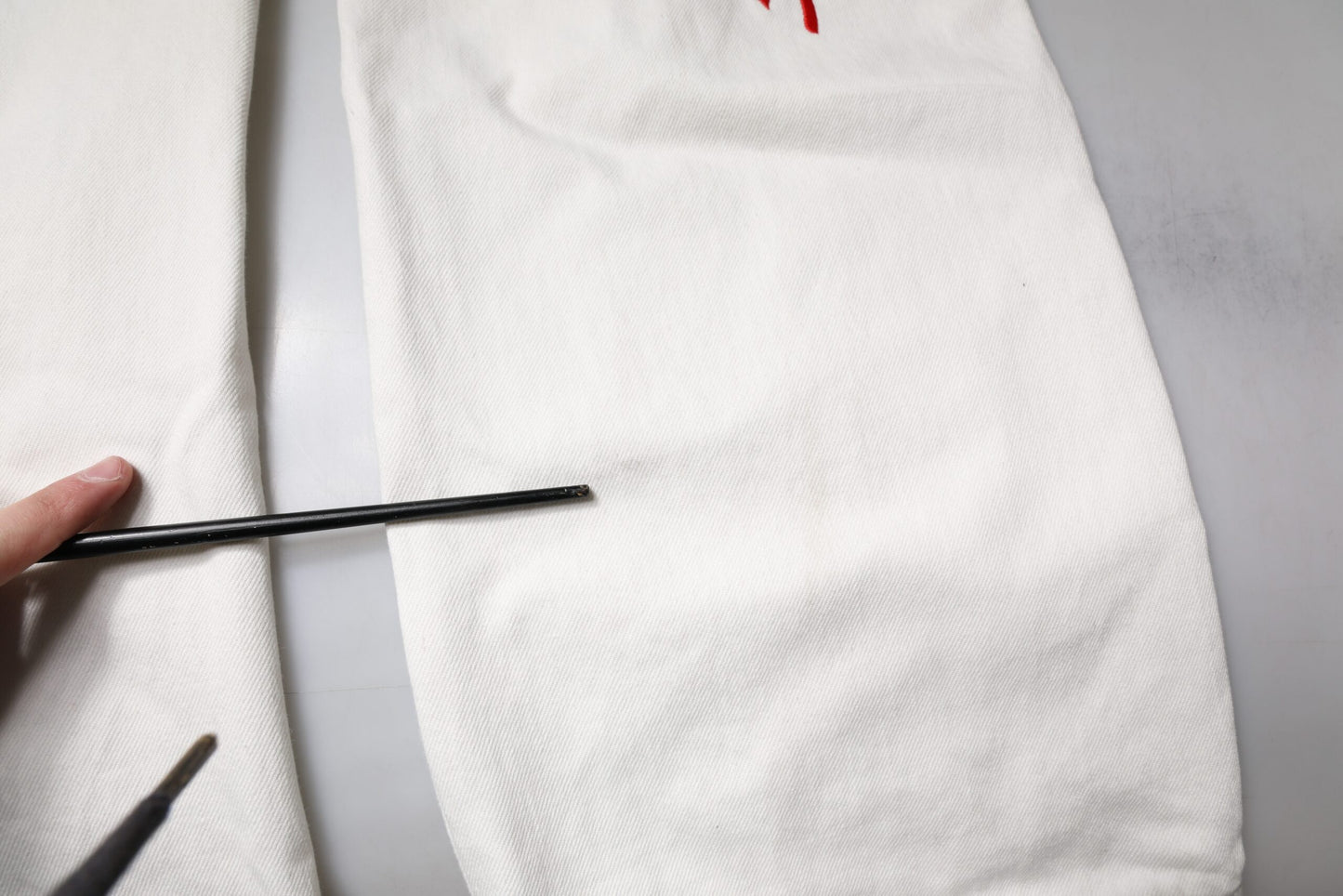 Dolce & Gabbana – Zerfetzte Jeans in geradem Denim in Weiß mit Korallenmuster