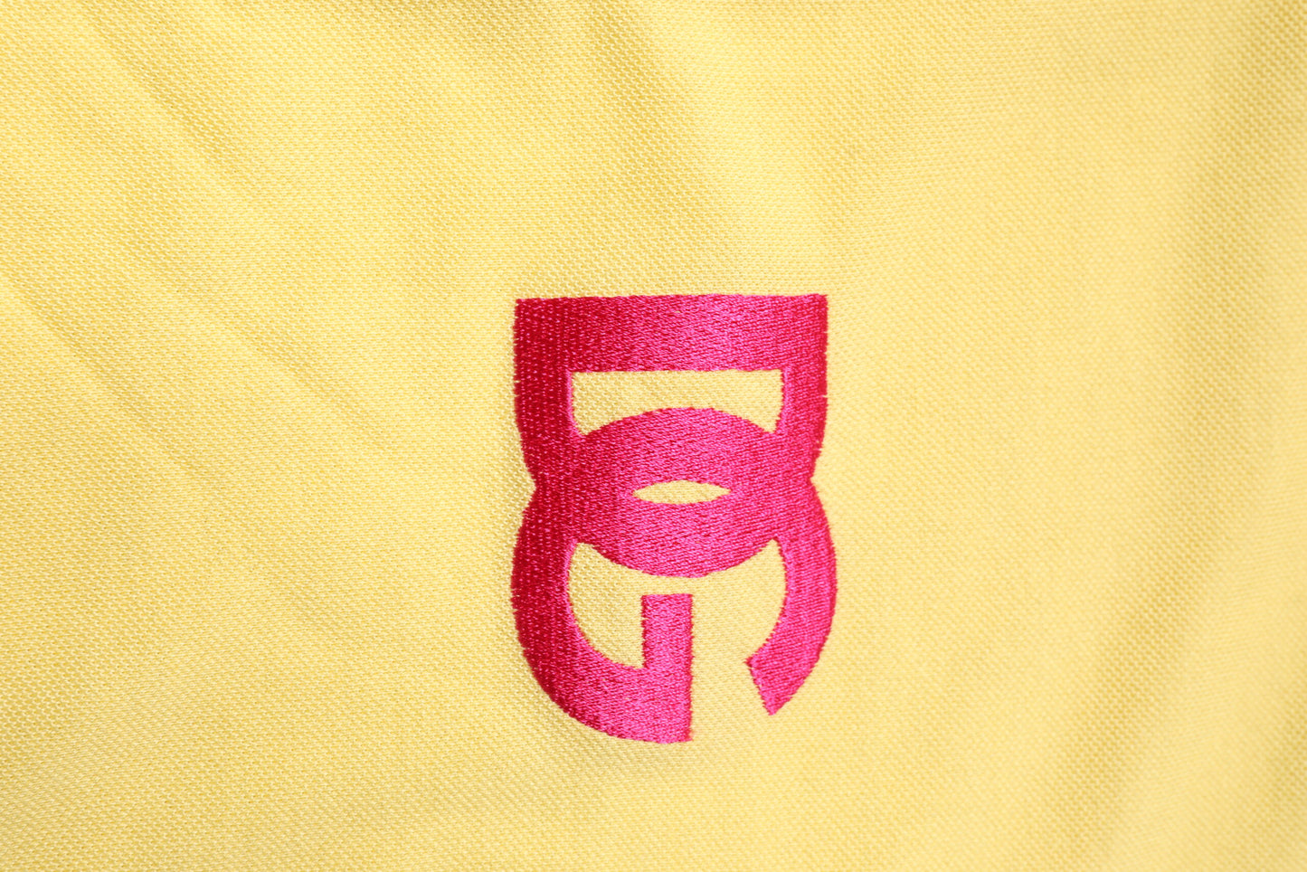 Dolce & Gabbana – Gelbes Poloshirt aus Baumwolle mit Logo und Kragen