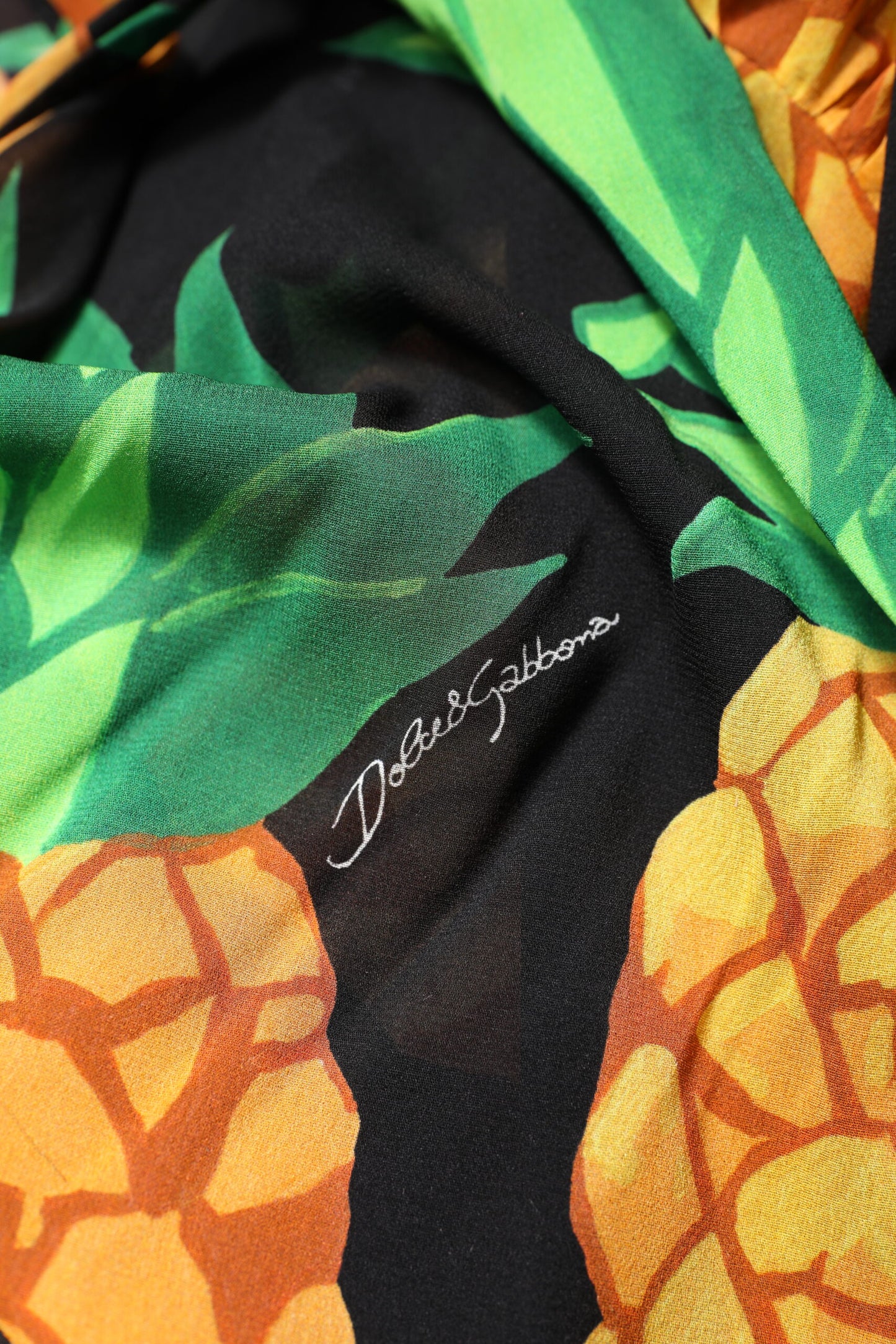 Dolce & Gabbana Schwarzes Wickelkleid aus Seide mit Ananas-Drapierung