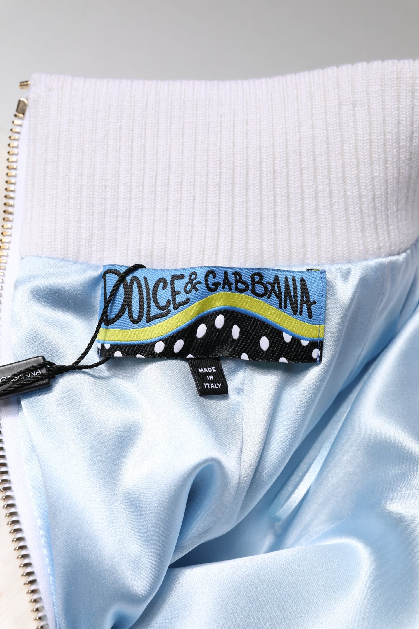 Dolce & Gabbana – Hoch taillierter Minirock aus Kunstpelz in Off-White