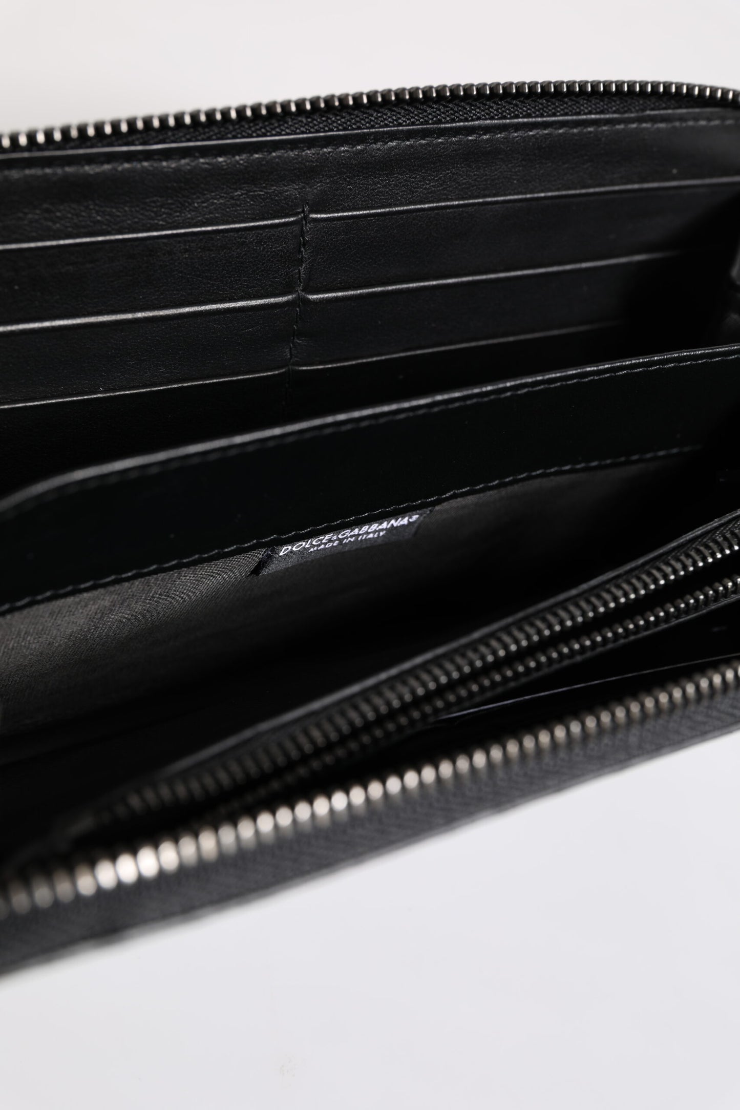 Dolce & Gabbana – Kontinentale Geldbörse aus exotischem Leder mit Prägung in Schwarz und Blau