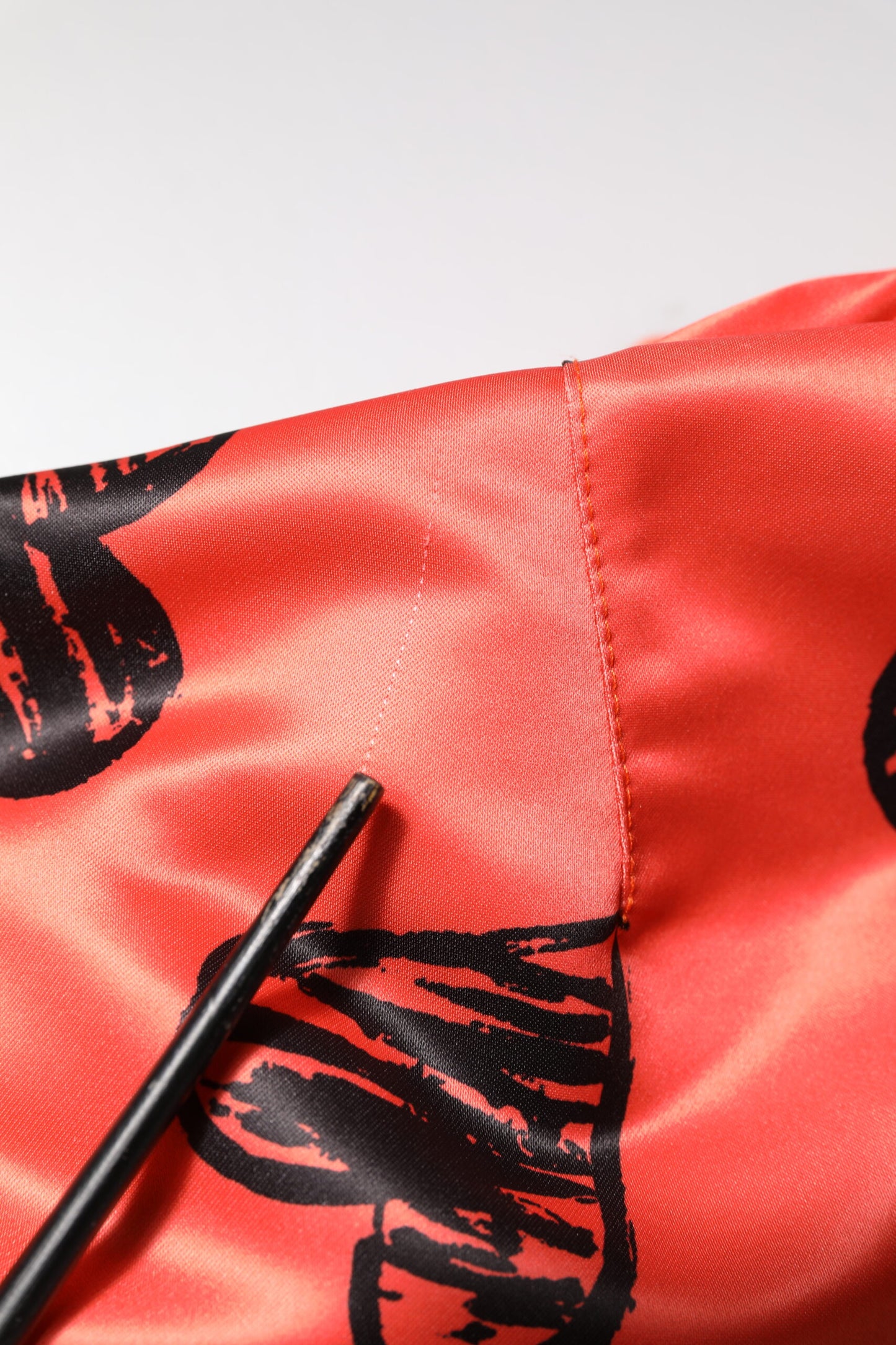 Dolce & Gabbana – Orangefarbene Bomberjacke mit durchgehendem Reißverschluss für Herren mit DG-Herz