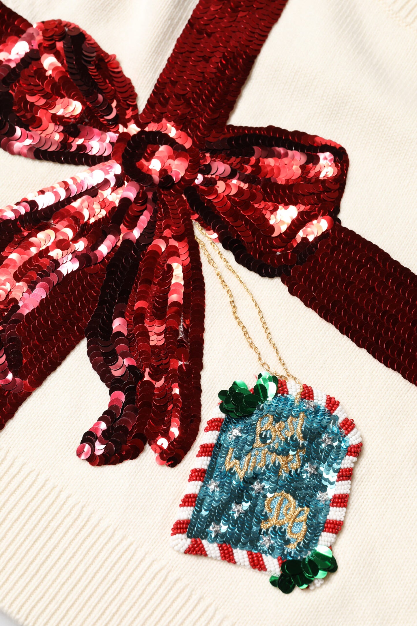 Dolce & Gabbana – Weißer Pullover mit Rundhalsausschnitt und Pailletten