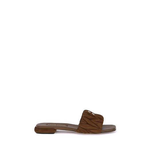 Miu Miu Schwarze Lammfell-Flatsandalen Modell Ovis Aries Aries