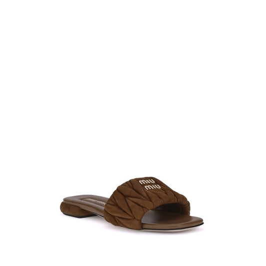 Miu Miu Schwarze Lammfell-Flatsandalen Modell Ovis Aries Aries