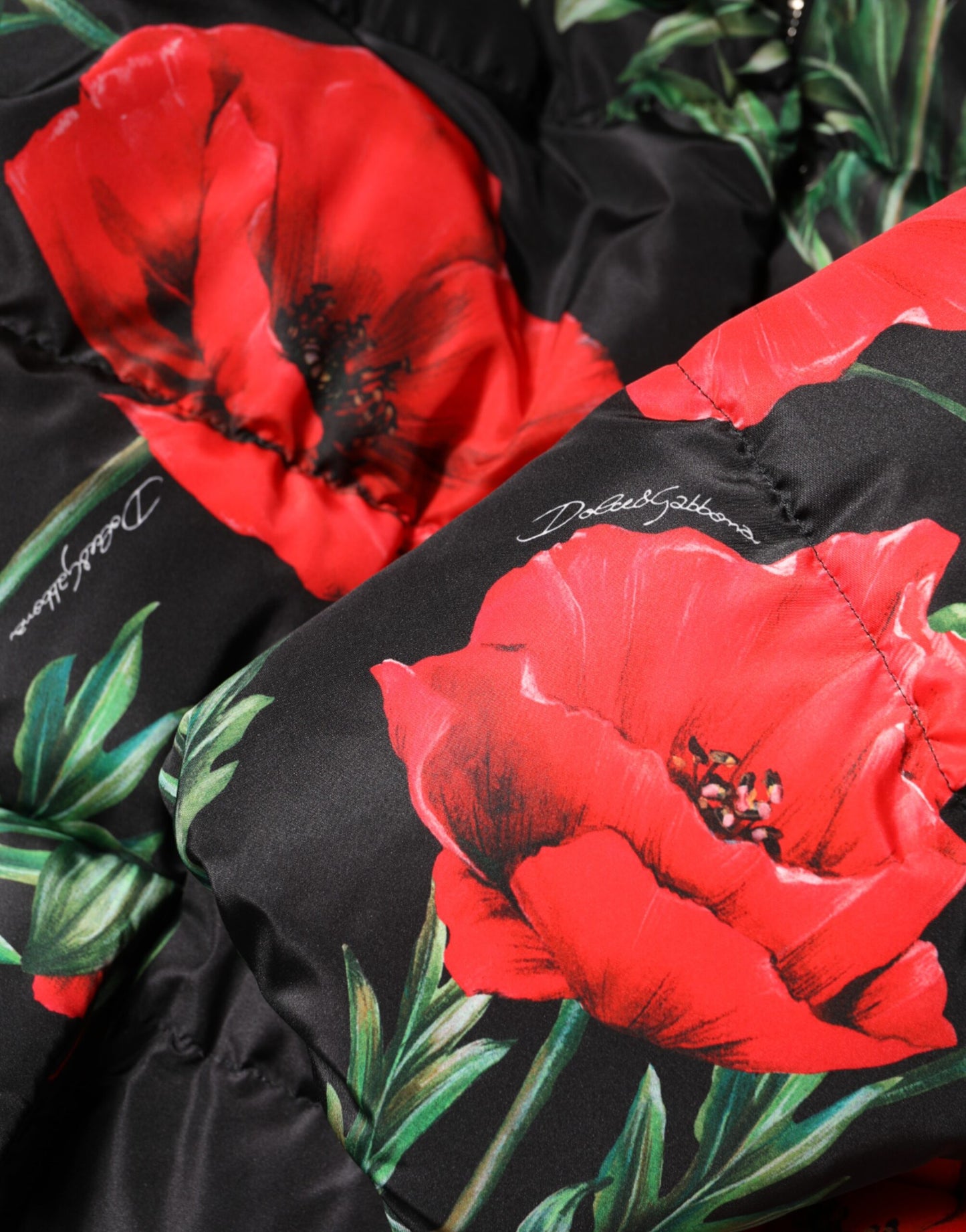 Dolce & Gabbana – Schwarze Steppjacke aus Polyester mit Blumenmuster und Kapuze
