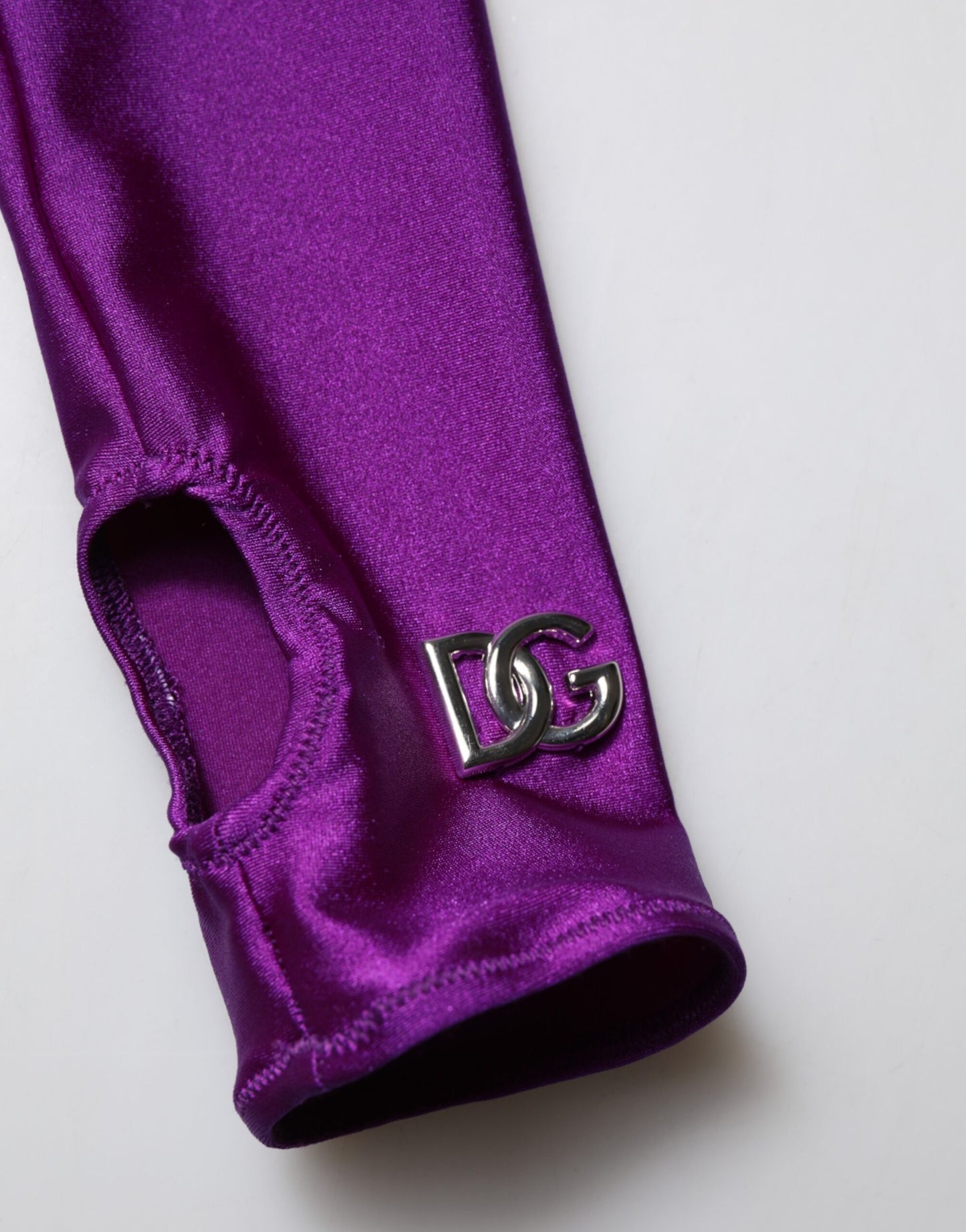 Dolce & Gabbana, Lila, figurbetontes Jumpsuit-Kleid aus Nylon mit Rollkragen