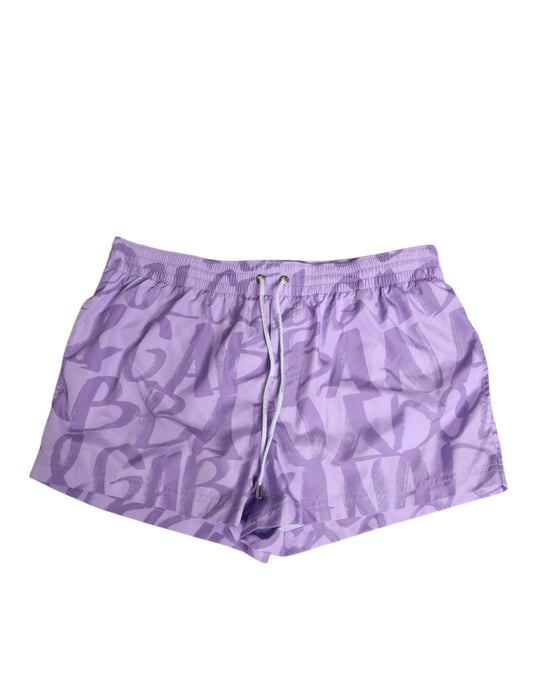 Dolce & Gabbana Lila DG Logo Print Nylon Herren Shorts Bademode