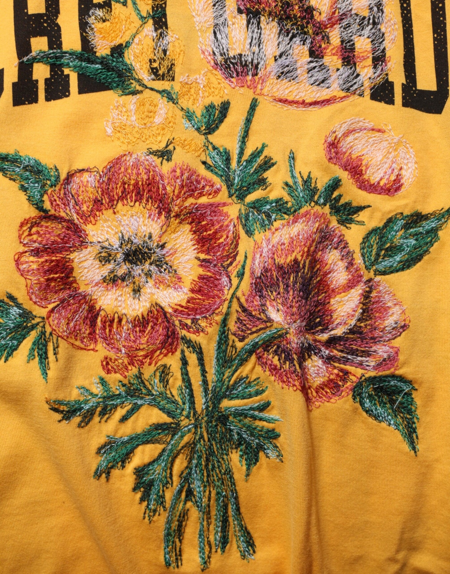 Dolce & Gabbana Gelbes T-Shirt aus Baumwolle mit Rundhalsausschnitt und Blumenmuster „Secret Graden“