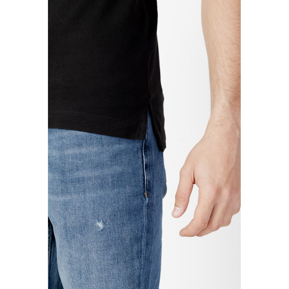 Tommy Hilfiger Jeans – Schwarzes Poloshirt aus Baumwolle