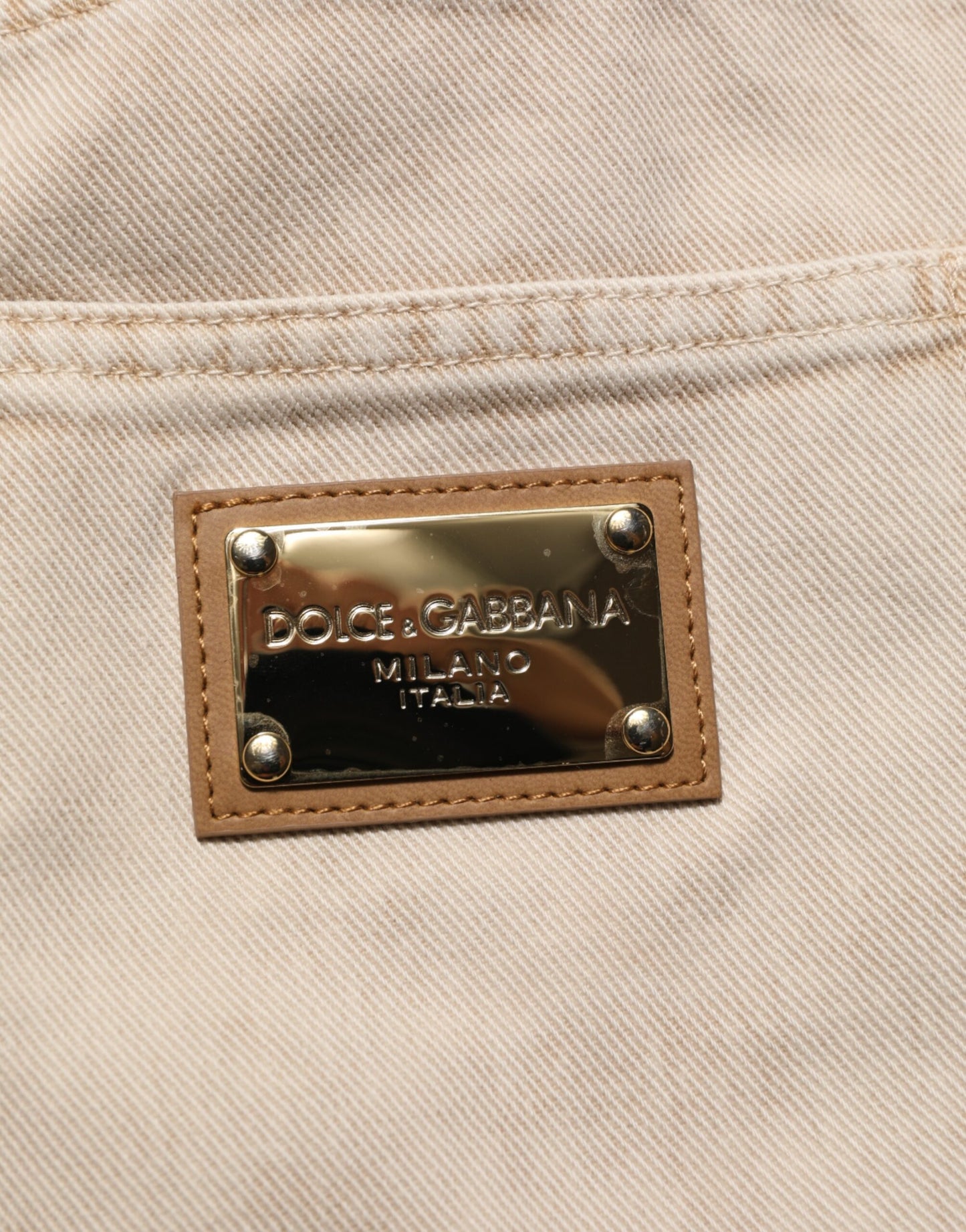Dolce & Gabbana – Gerade geschnittene Jeanshose aus Baumwolle in Beige