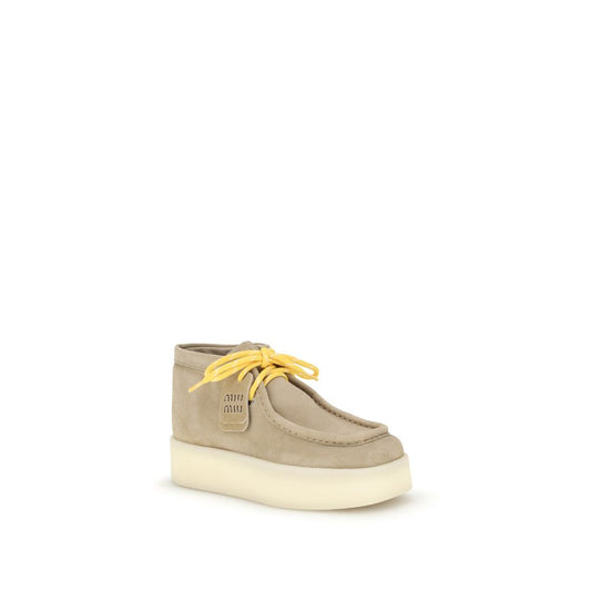 Miu Miu Plateau-Stiefeletten aus Leder