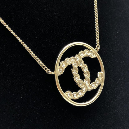 Chanel Gold Tone CC Circle Pendant Necklace