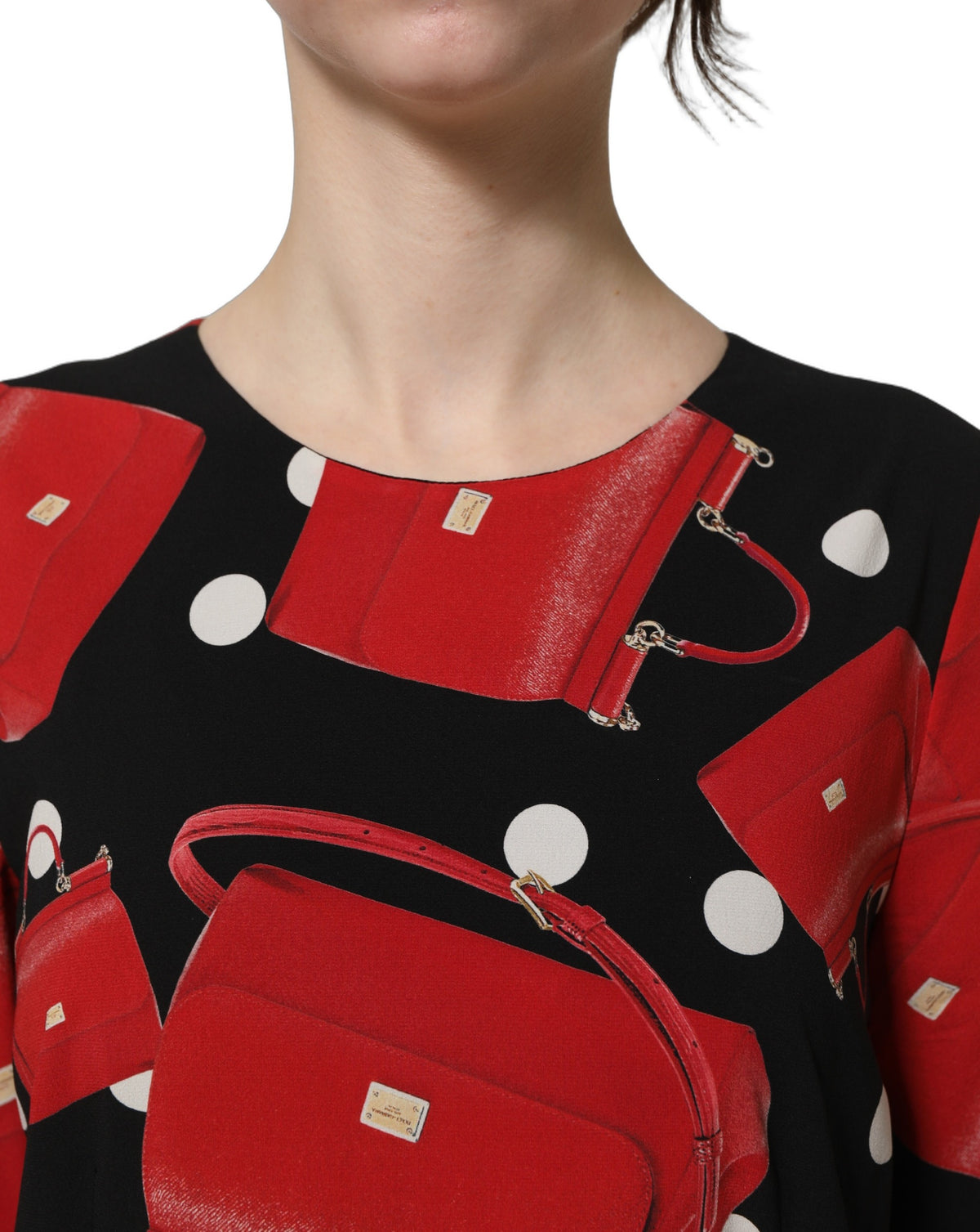 Dolce & Gabbana Schwarzes Etuikleid mit Handtaschen-Print und langen Ärmeln