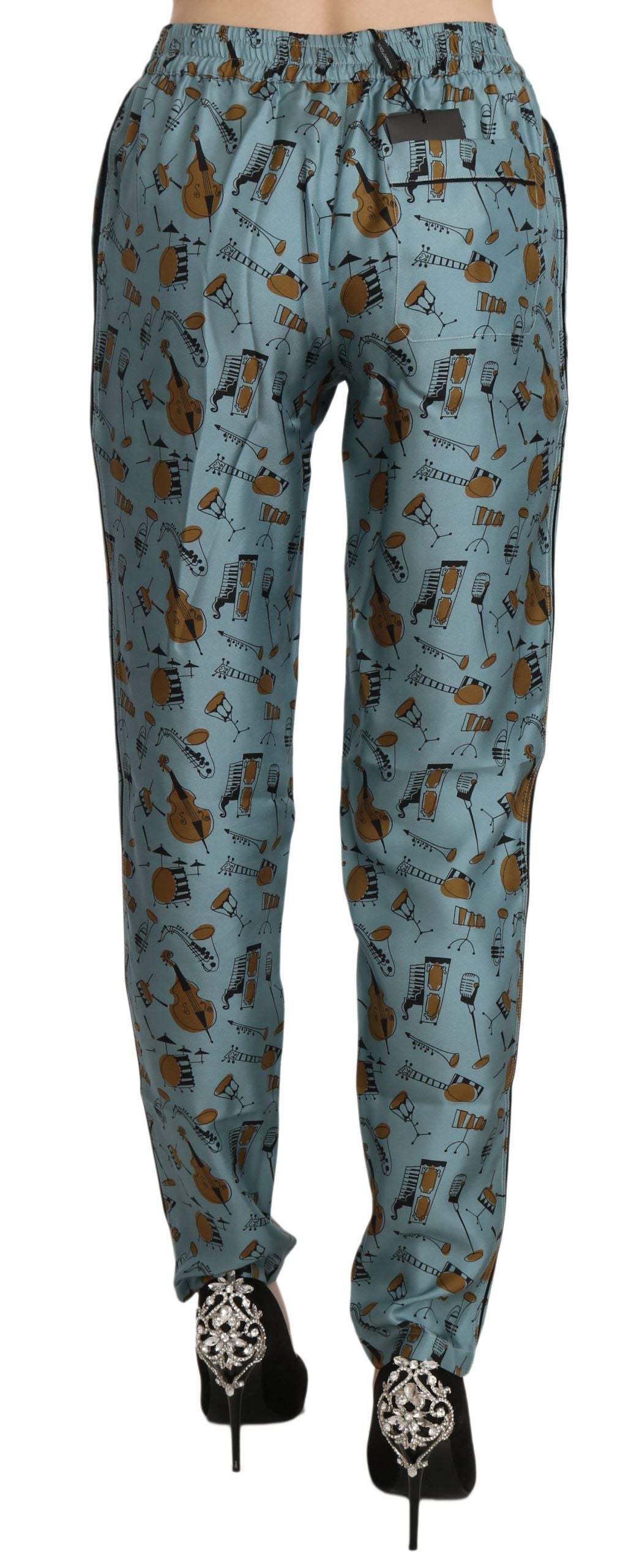 Dolce &amp; Gabbana – Karottenhose mit Musikinstrumenten-Print in Blau