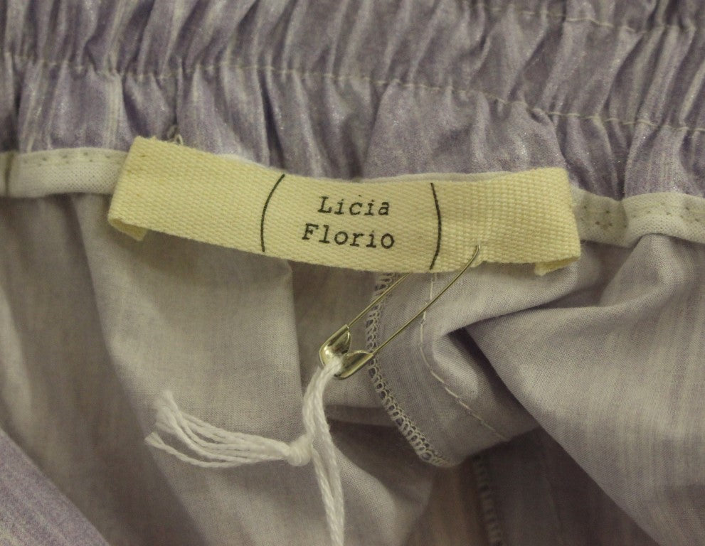 Licia Florio – Lila Wickelshorts über dem Knie
