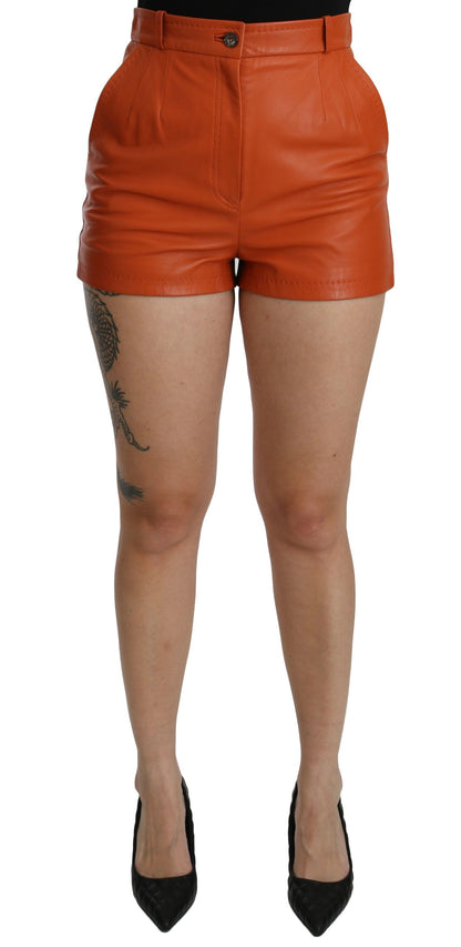 Dolce &amp; Gabbana – Orangefarbene Hotpants-Shorts aus Leder mit hoher Taille