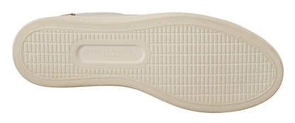 Dolce &amp; Gabbana – Niedrige Sneakers aus weißem und goldenem Leder