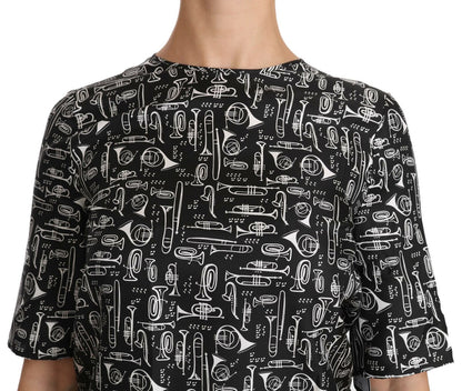 Dolce &amp; Gabbana – Schwarze Seidenbluse mit Musikinstrumenten-Print