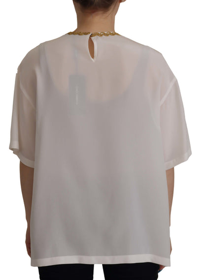 Dolce &amp; Gabbana Blusentop aus weißer Seide mit goldener DG-Krone und Kristallen