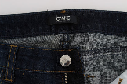 Costume National – Slim Fit Bootcut-Jeans aus Baumwolle in Blau