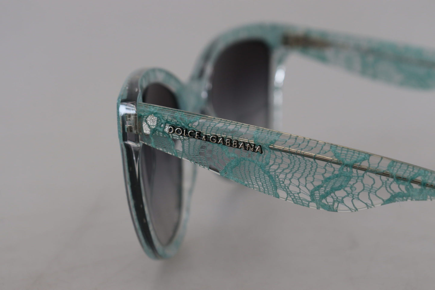 Dolce &amp; Gabbana – Runde Sonnenbrille DG4190 aus Acetat mit blauer Spitze und Kristallen