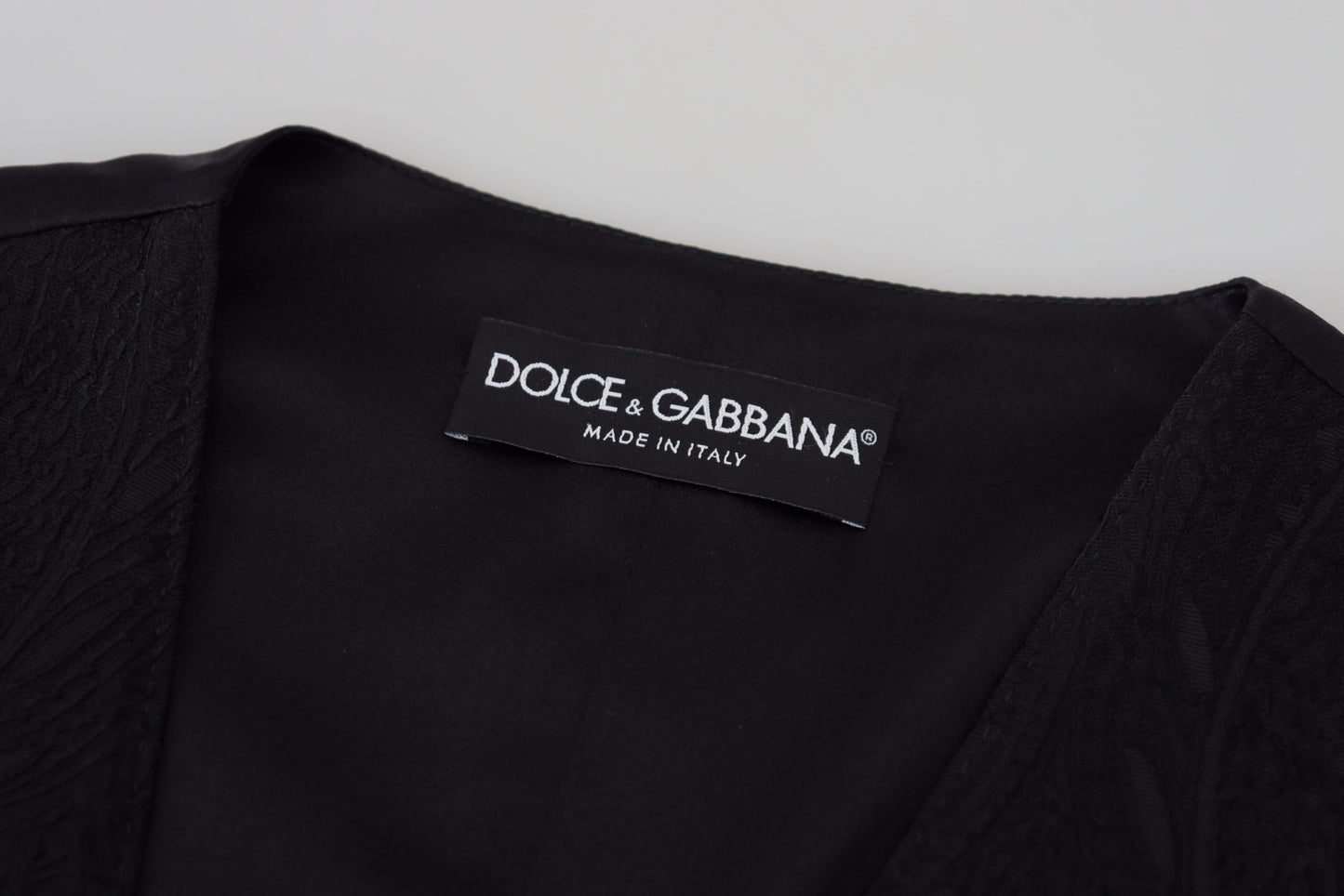 Dolce &amp; Gabbana – Schwarzes, ärmelloses Brokat-Top mit Knopfleiste