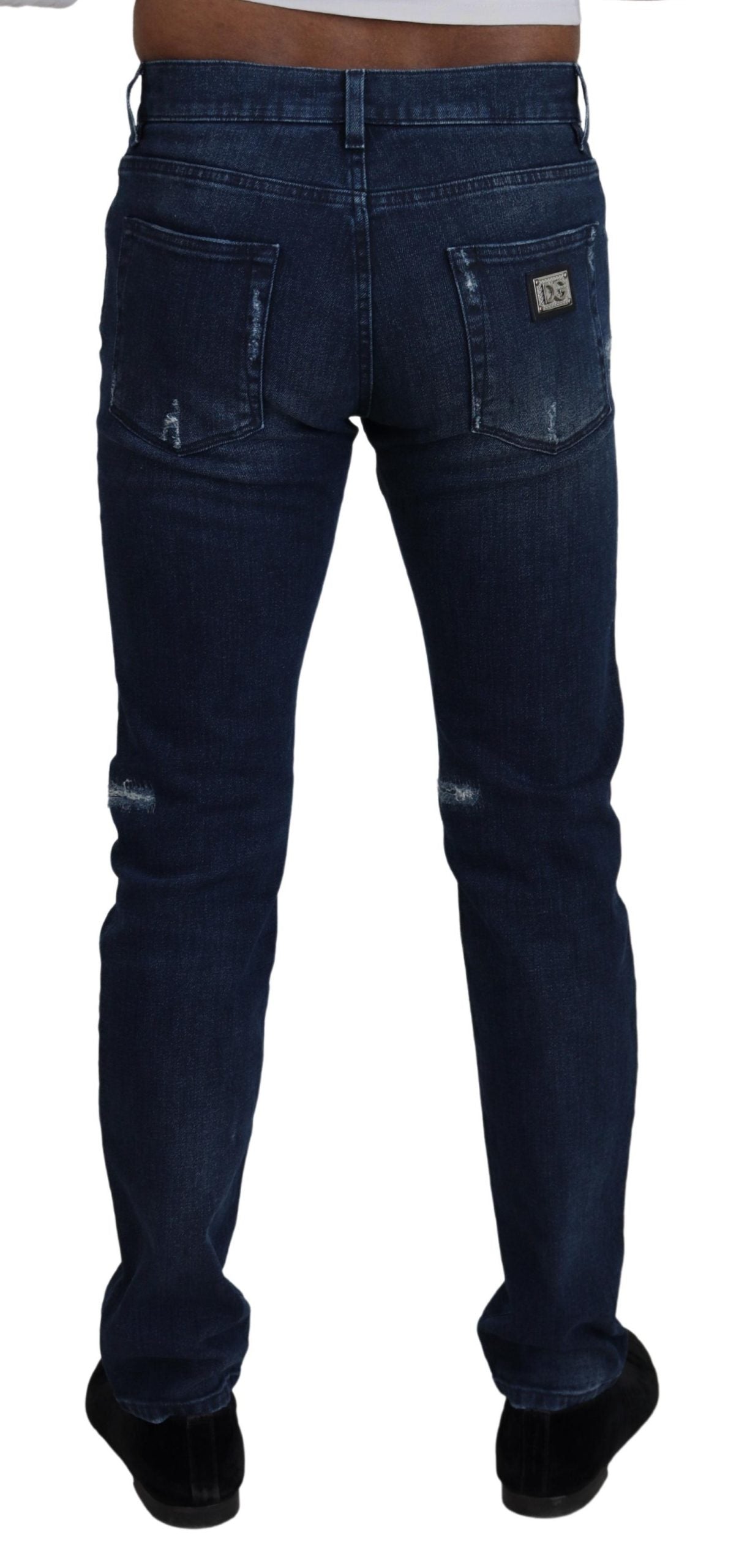 Dolce &amp; Gabbana – Skinny-Jeans aus zerfetztem Baumwoll-Denim in Blau