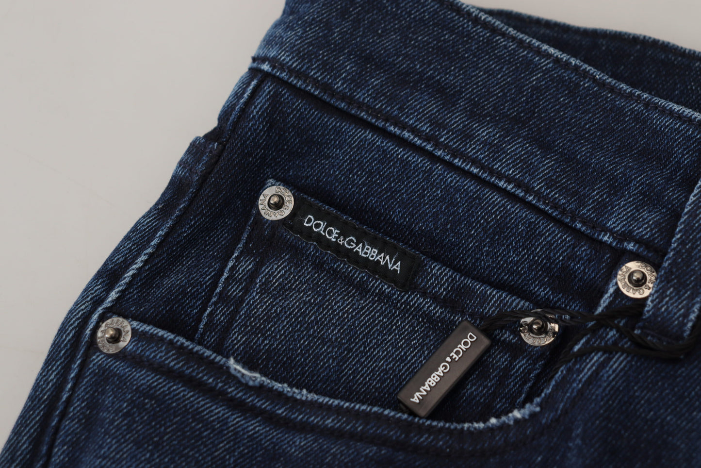 Dolce &amp; Gabbana – Skinny-Jeans aus zerfetztem Baumwoll-Denim in Blau