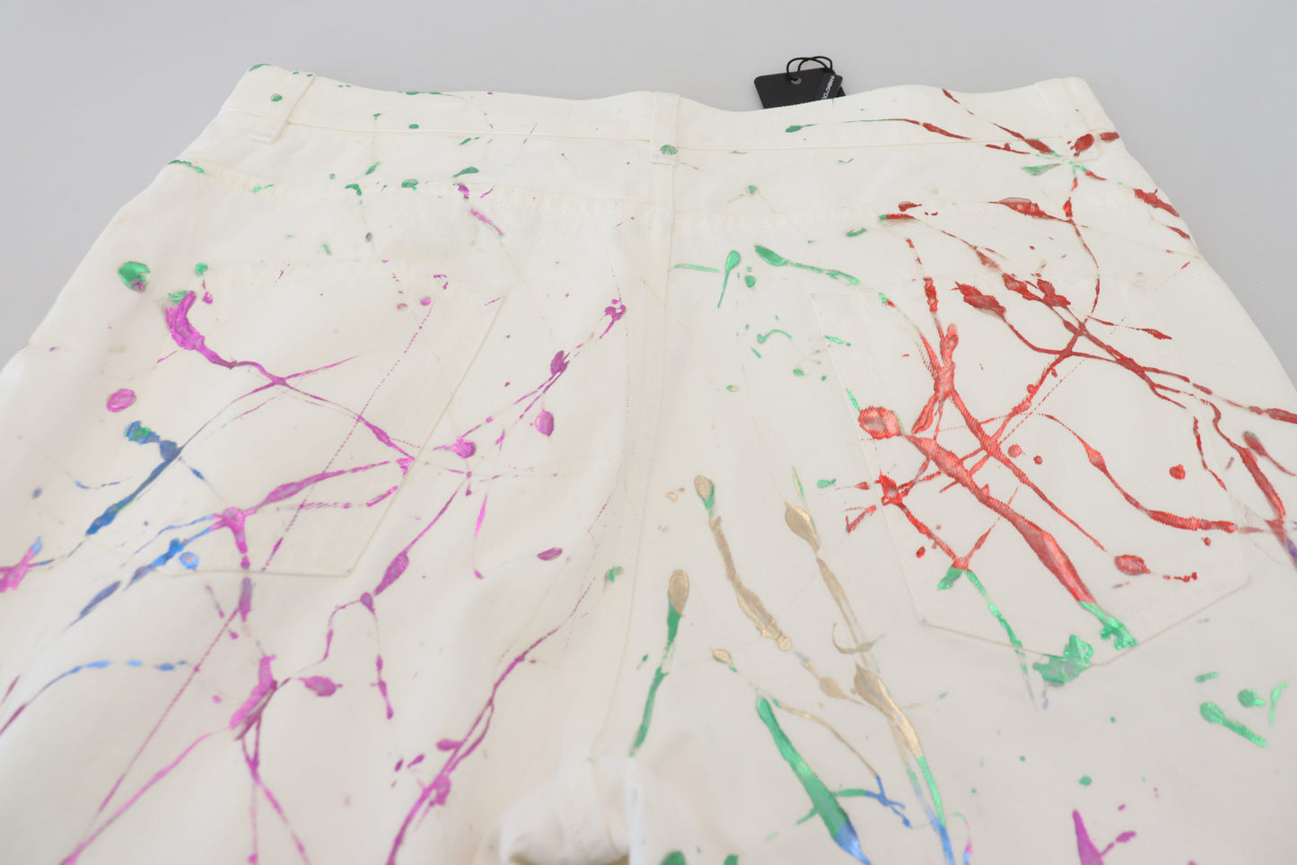 Dolce &amp; Gabbana – Weiße Jeanshose aus Baumwolle mit Farbspritzer-Print