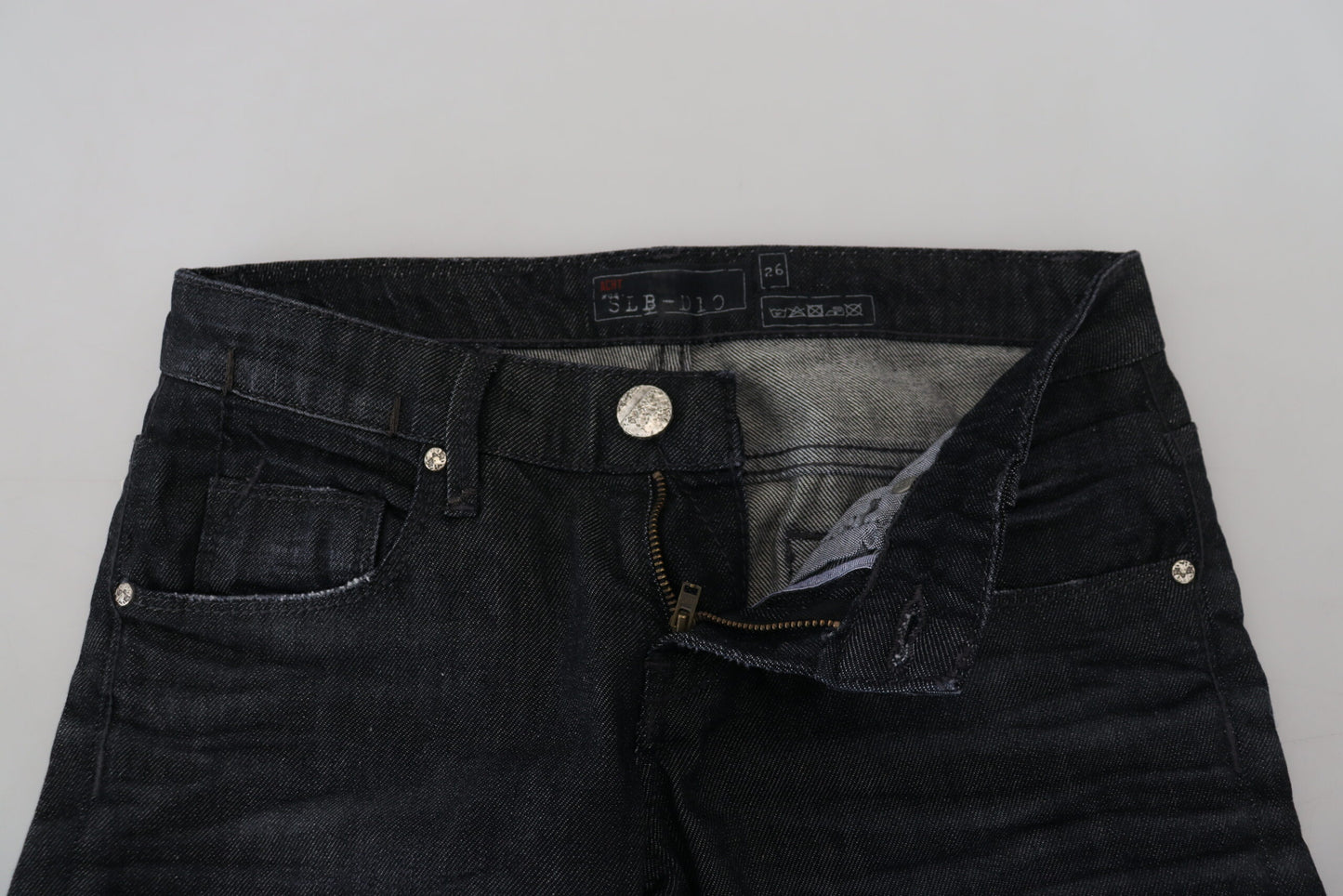 Acht Schwarze, schmal geschnittene Damen-Jeans aus Baumwolle mit niedriger Taille