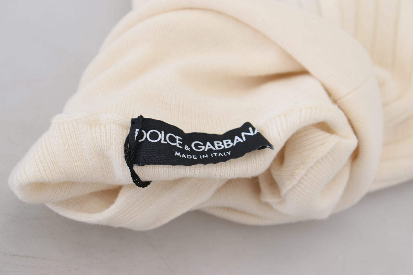 Dolce &amp; Gabbana – Elfenbeinfarbener Rollkragenpullover mit Distressed-Manschetten