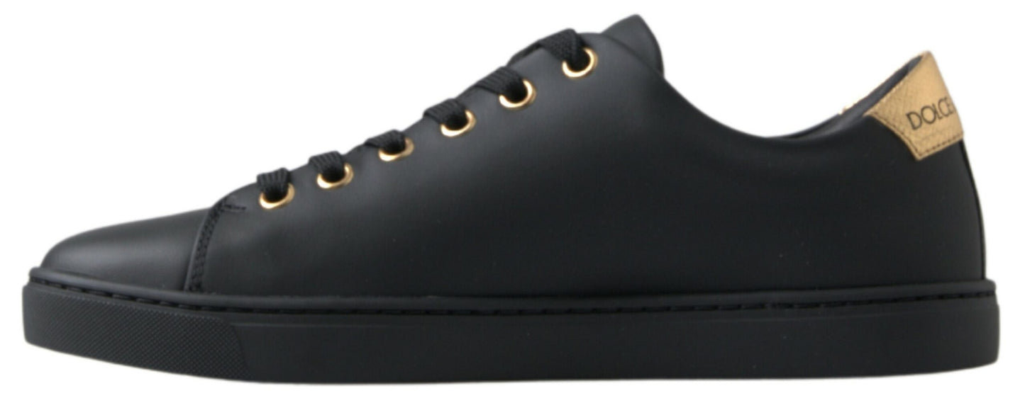 Dolce &amp; Gabbana Klassische Sneakers aus schwarzem und goldenem Leder