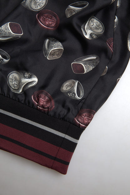 Dolce &amp; Gabbana – Schwarzer Seidenpullover mit Rundhalsausschnitt und Ringprint