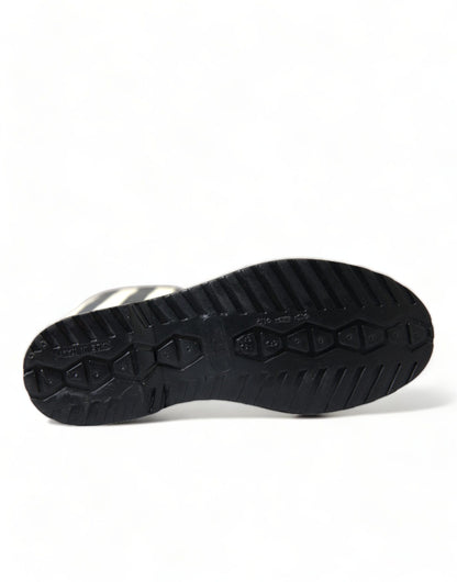 Dolce &amp; Gabbana – Kniehohe, flache Stiefel aus schwarzem Gummi