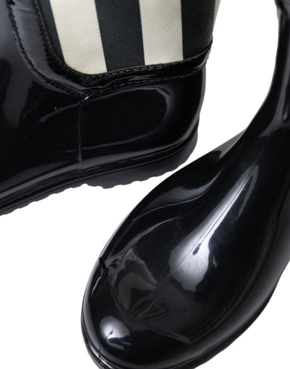 Dolce &amp; Gabbana – Kniehohe, flache Stiefel aus schwarzem Gummi